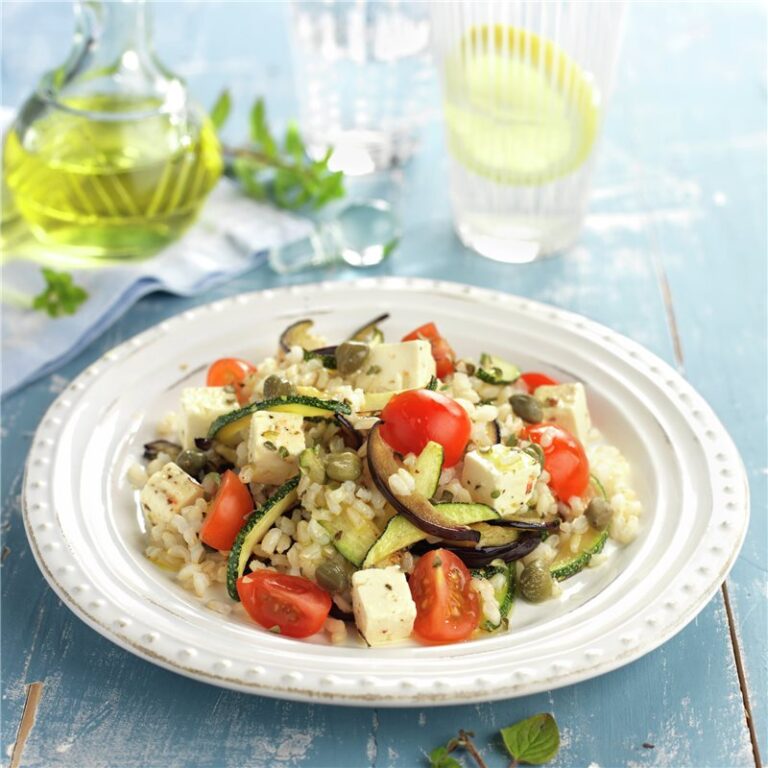 Rice salad with zucchini, peppers and eggplant