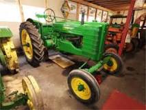 How old must a tractor be to be able to carry out a transfer?