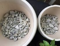 What stones are used for flower pot drainage?