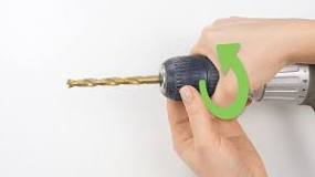 How do you remove the bit from a drill?