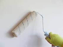 What do you put on the wall before painting?