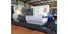 What is a CNC machine and how is it composed?