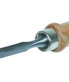 What tool is used to carve the wood?