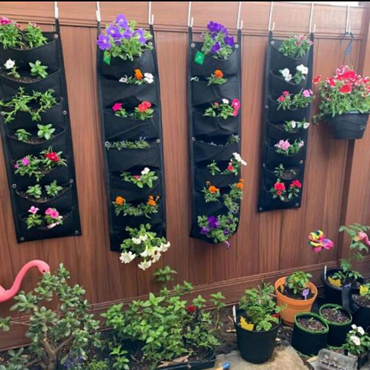 flower pots in a bag on the wall Source_AliExpress